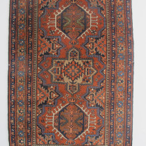 Cute Heriz Rug - This pretty little Heriz rug is one of a group of rugs which is becoming increasingly hard to find. Lovely subtle colours, especially the terracotta field, but also the greens, blues and yellows. The ubiquitous triple medallion design is generously spaced and is framed by elegant borders. The whole composition is elegant and charismatic and would provide a charming sense of style in many decorative settings. Finely woven and very soft wool. Very good condition and professionally cleaned. Image of Cute Heriz Rug